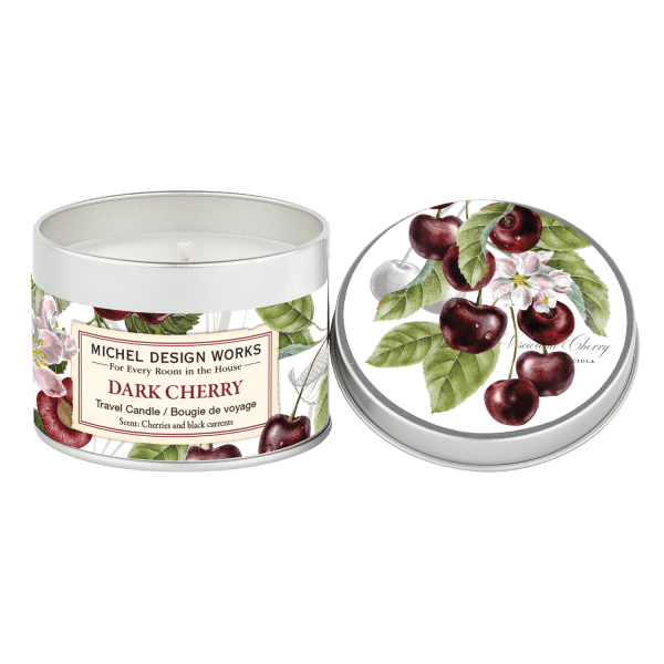 Two cherry-scented candles in round metal tins with floral cherry artwork