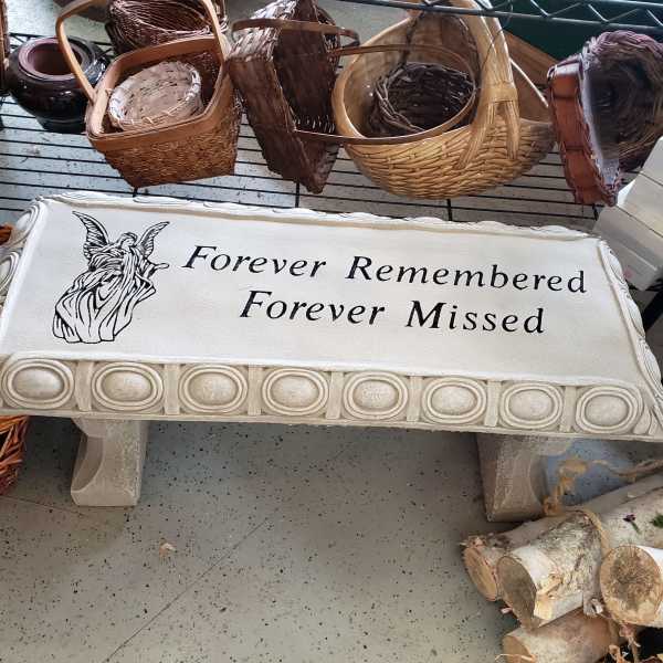 Memorial bench with angel graphic and the words Forever Remembered Forever Missed