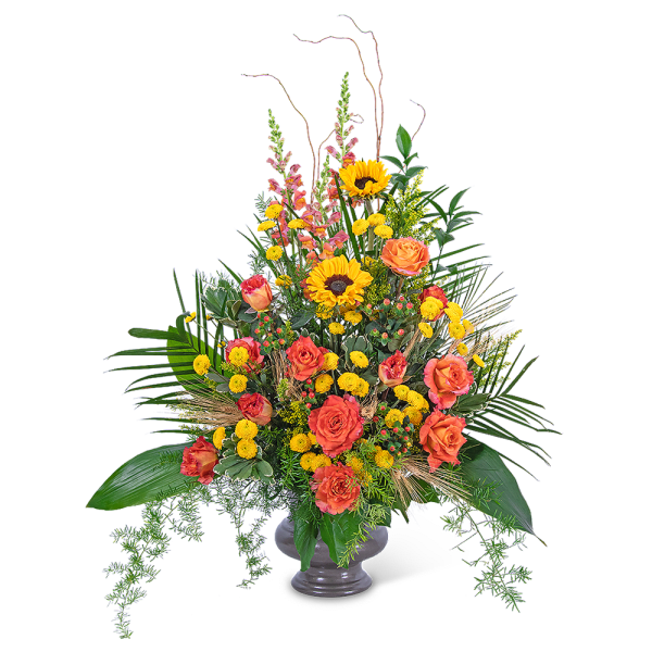 Tall arrangement of orange roses and yellow sunflowers in a gray vase