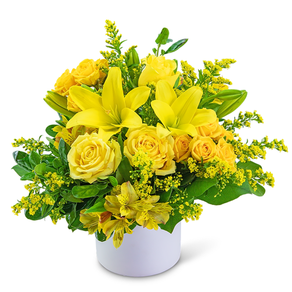 Yellow roses and lilies arranged in a white vase
