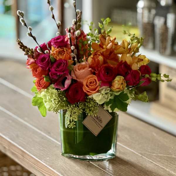 Colorful mixed bouquet in a clear glass vase