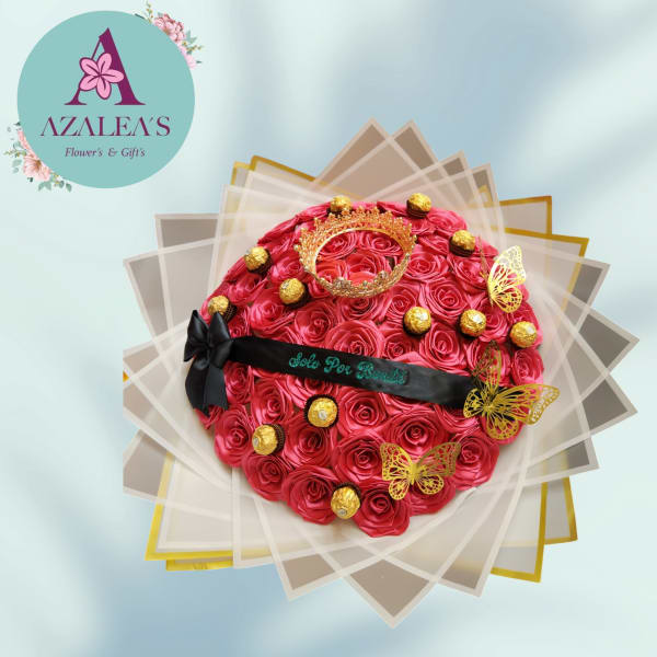 Round bouquet of red roses with gold chocolates and a crown