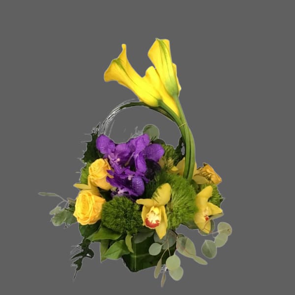Yellow and purple floral basket arrangement with orchids and roses