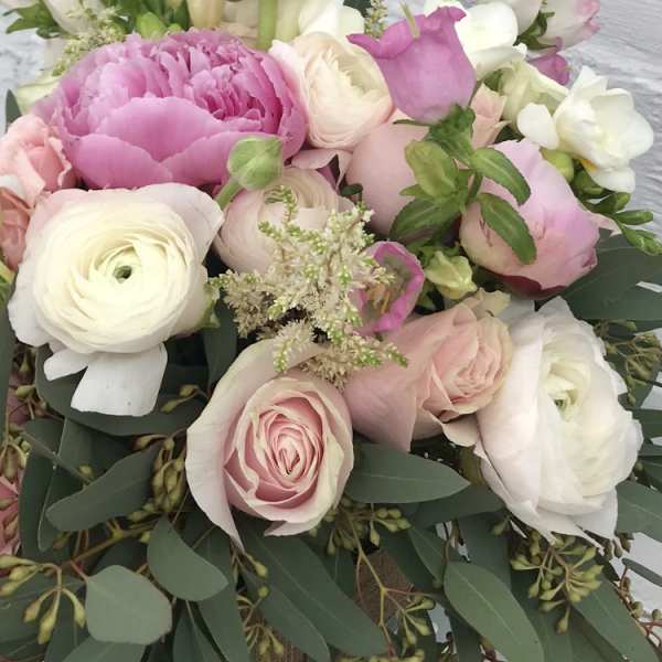 Pink and white mixed bouquet with roses and ranunculus