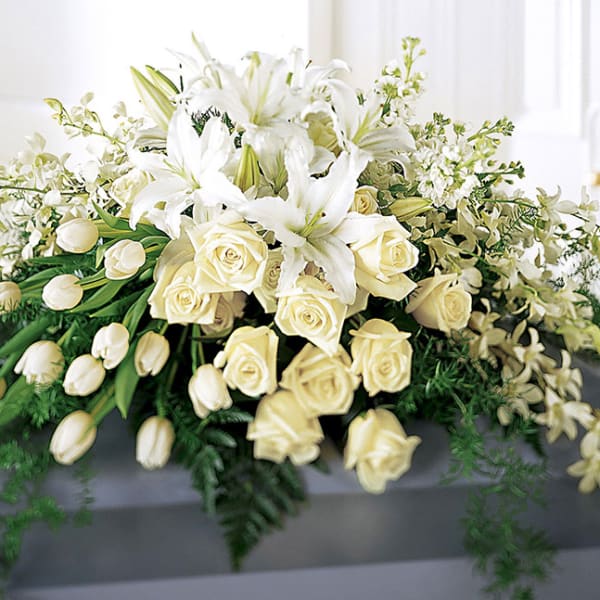 All white elegant casket spray