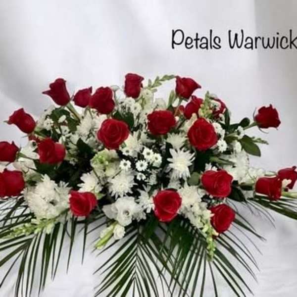 Red Roses & White Casket Spray by Petals