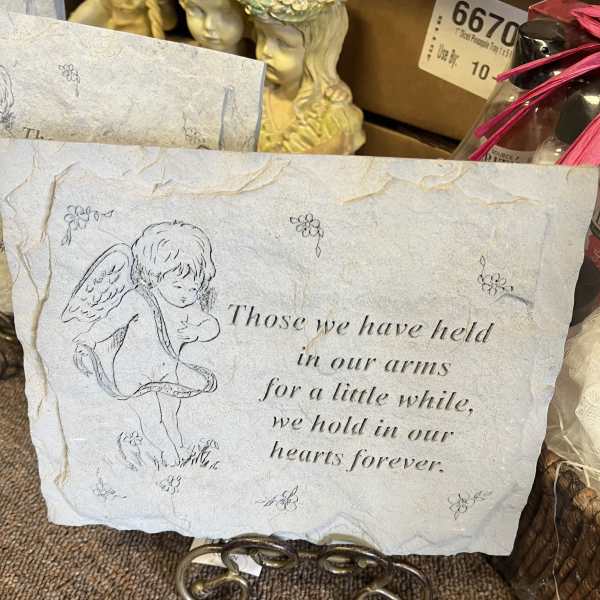 Decorative sympathy plaque with an angel and memorial quote