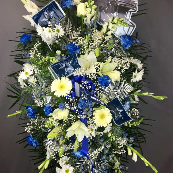 Dallas Cowboys-themed standing floral spray with blue and white flowers