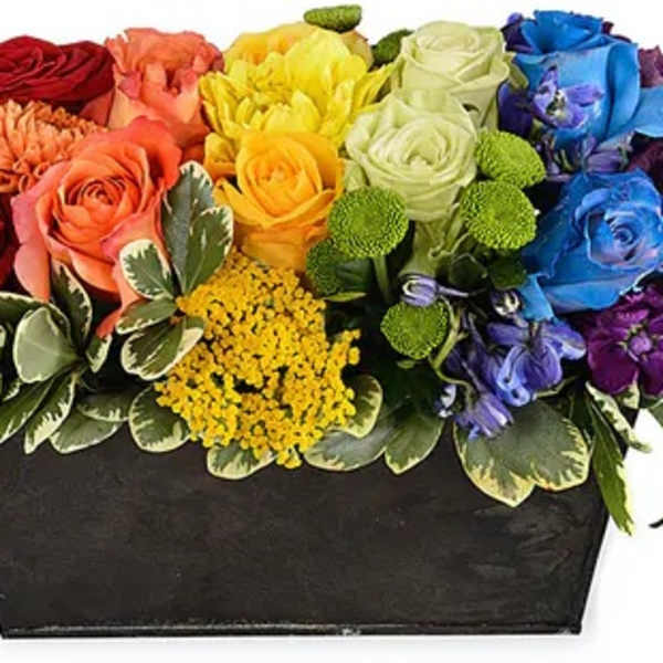 Rainbow rose arrangement in a black rectangular container