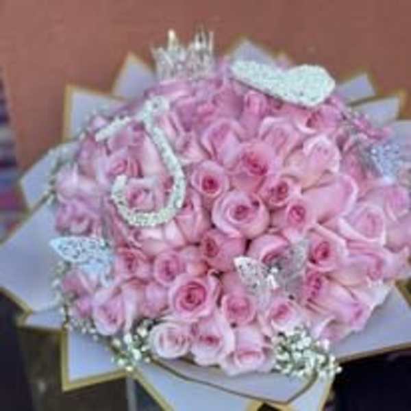 Bouquet of pink roses with silver decorative accents