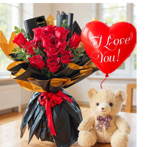 Red rose bouquet with a heart balloon and teddy bear