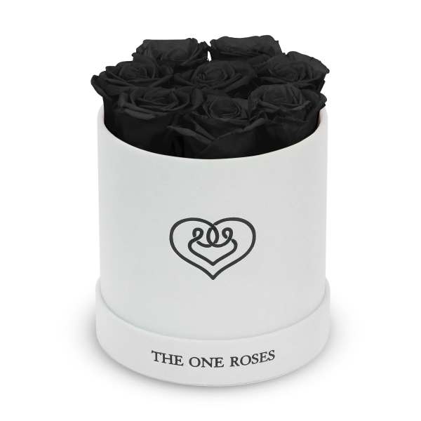 Black roses in a white round box with a heart logo
