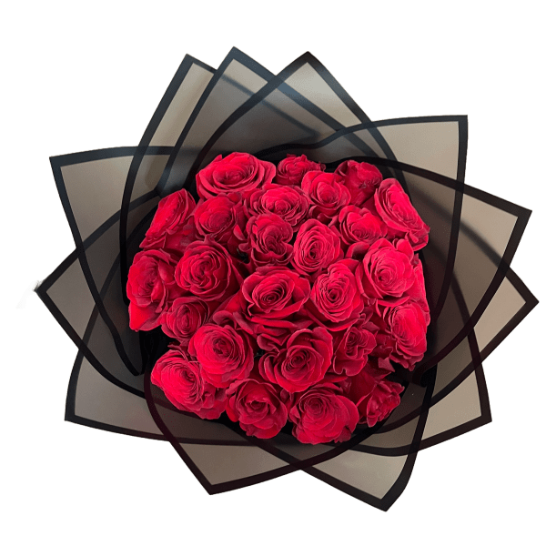 Bouquet of red roses wrapped in black paper