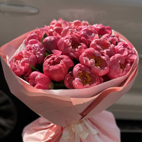 Coral peonies bouquet. The photo shows a deluxe size.