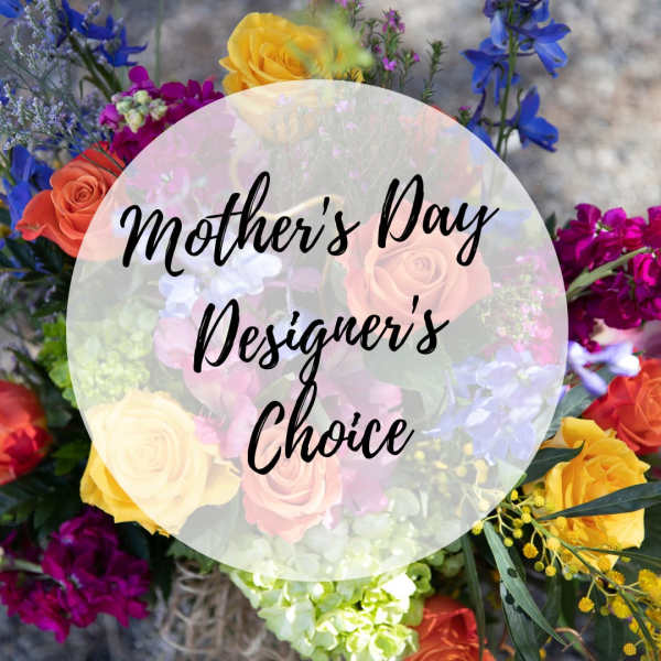Colorful mixed bouquet with roses and blue flowers, overlaid with Mother's Day Designer's Choice text
