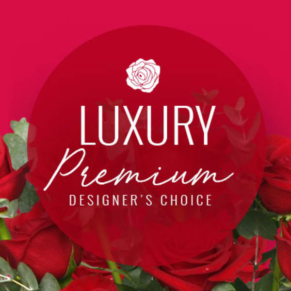 Red roses with a "Luxury Premium Designer's Choice" label