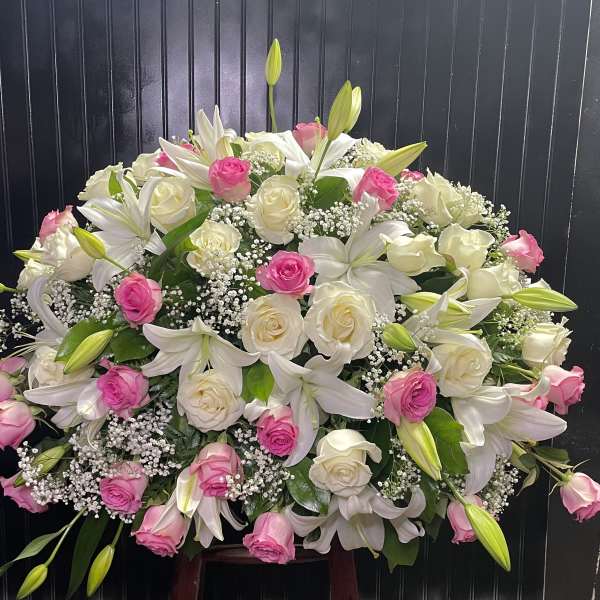 Large bouquet of white lilies and pink and white roses