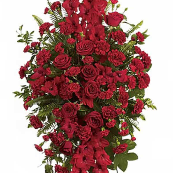 Tall red floral standing spray with roses and carnations