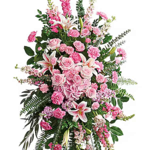 Tall pink floral standing spray with roses and lilies