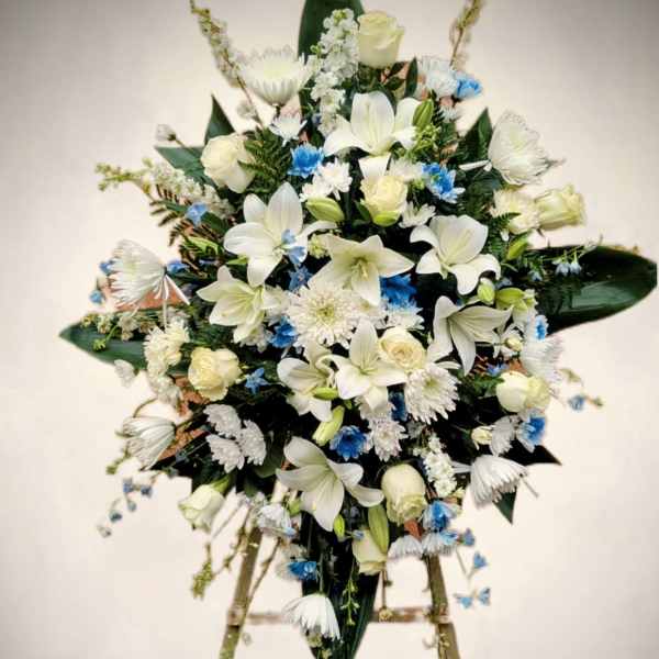 Elegant White and Blue Standing Sympathy spray