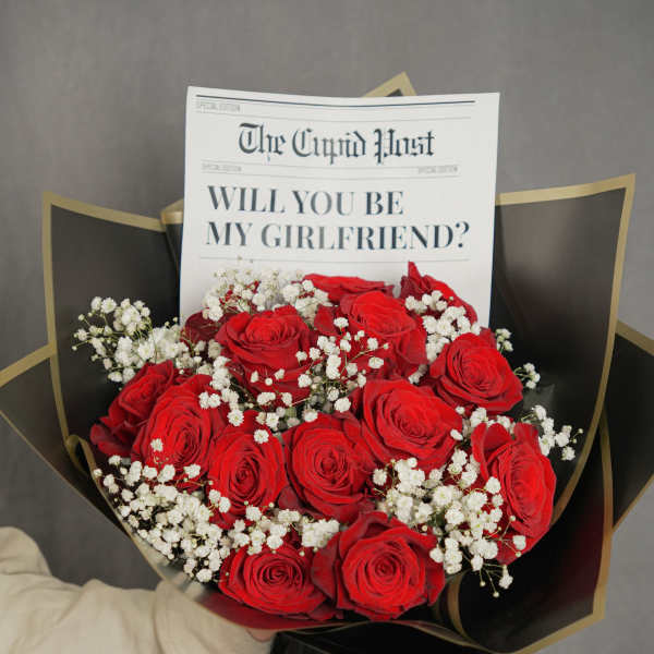 Red rose bouquet with baby's breath and a proposal card