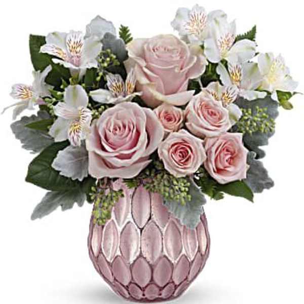 Pink roses and white alstroemeria in a pink textured vase
