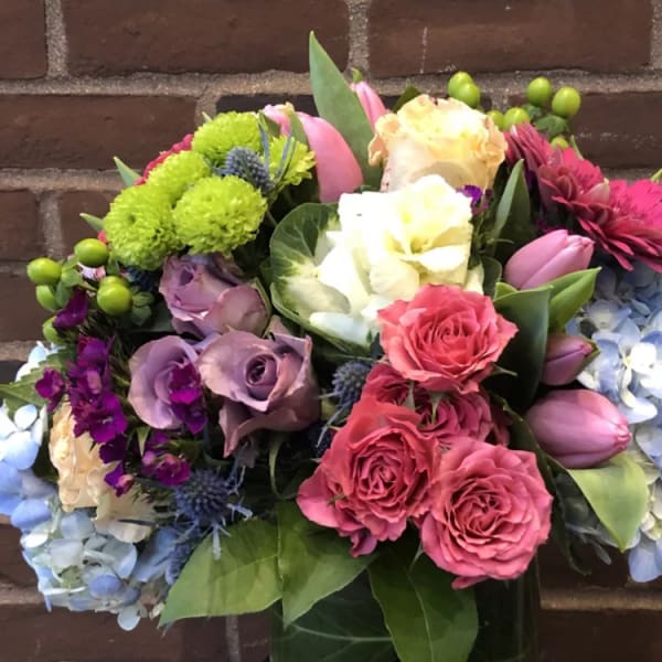 Colorful bouquet with roses, hydrangeas, and mixed blooms