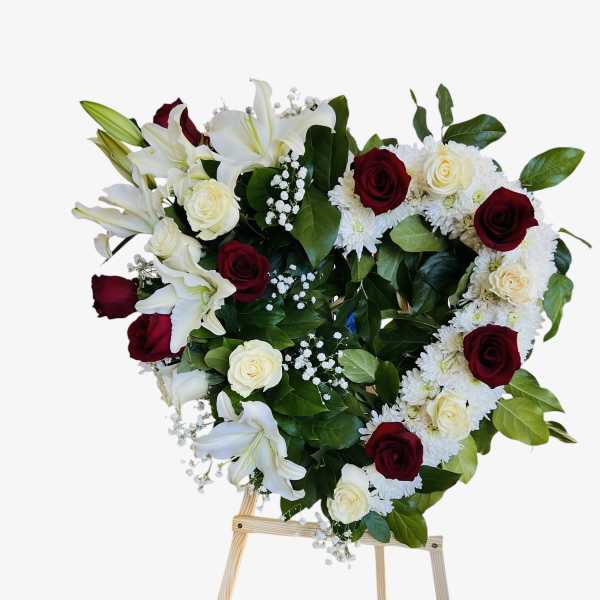 Red & white heart shaped funeral arrangements