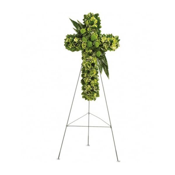 Green floral cross on a metal easel stand