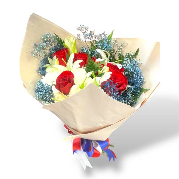 Bouquet of red roses and white lilies wrapped in beige paper