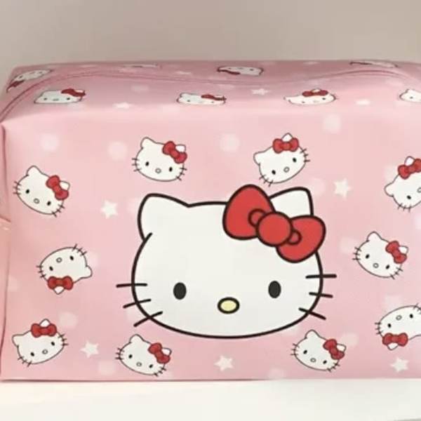 Pink Hello Kitty zippered pouch with a wrist strap