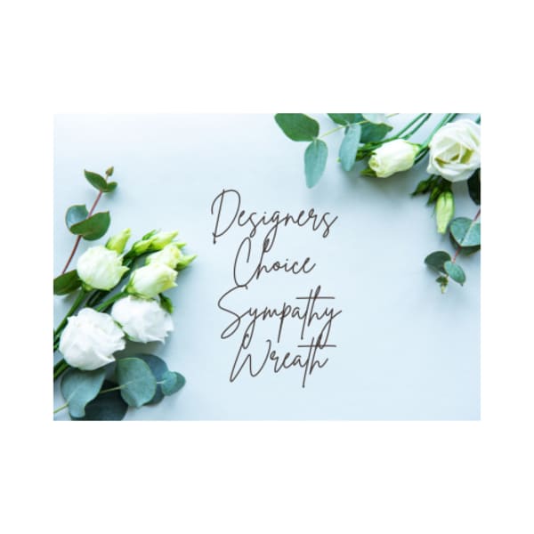 White roses with eucalyptus around sympathy wreath text