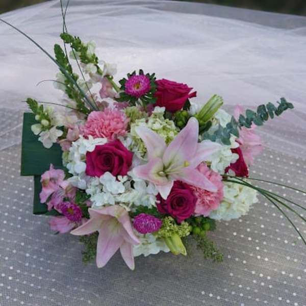 Pink and white mixed bouquet with lilies and roses