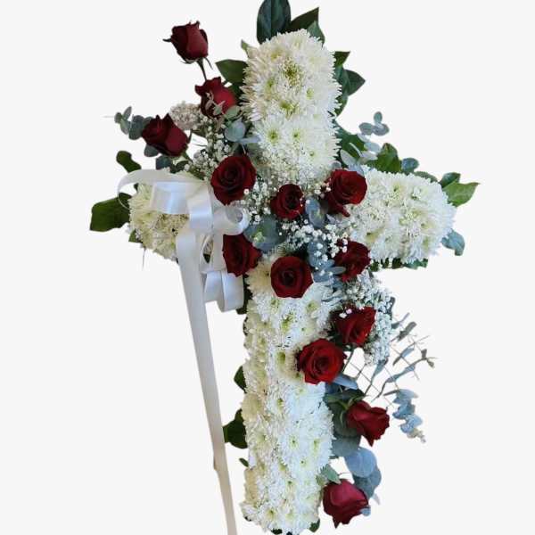 Red roses cross funeral arrangement