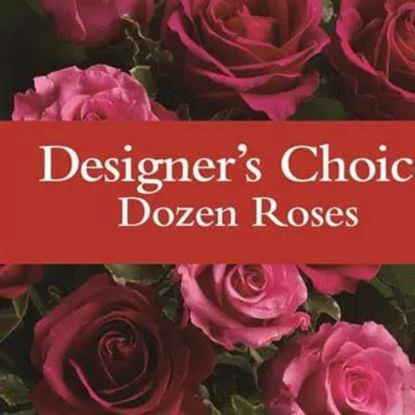 Dozen roses in shades of pink and red with a text banner across the center