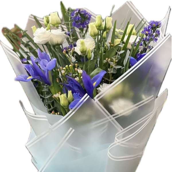 Bouquet of white and blue flowers wrapped in pale blue paper with a blue ribbon