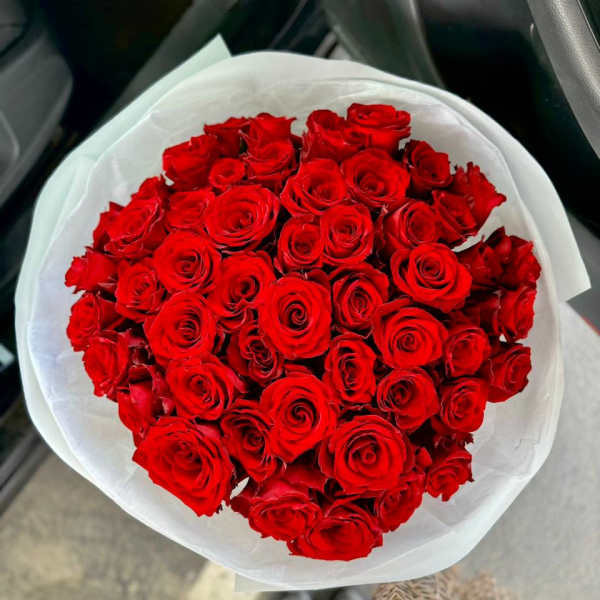 Classic bouquet of 50 red roses in beautiful packaging.