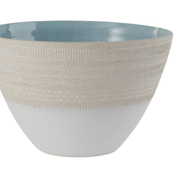 Textured white ceramic planter with a pale blue interior