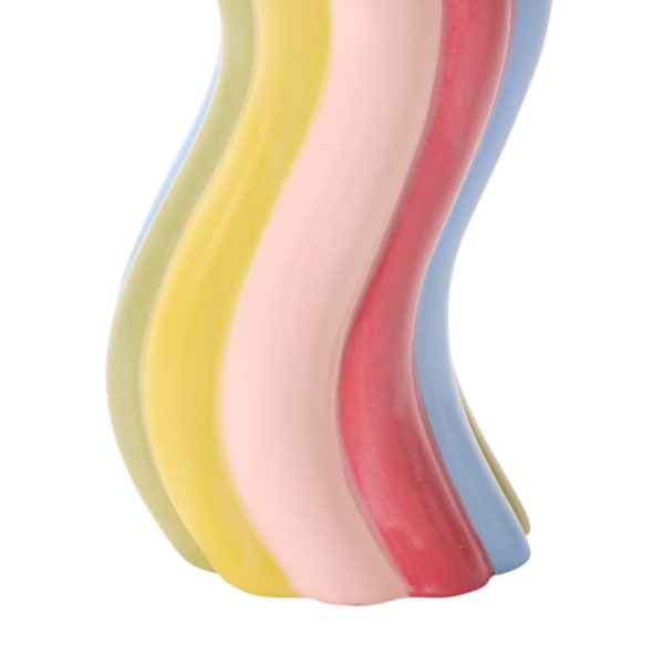 Curved striped ceramic vase in pastel colors