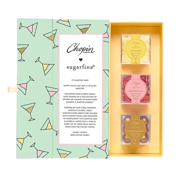 Gift box with three candy cubes in a martini-themed package