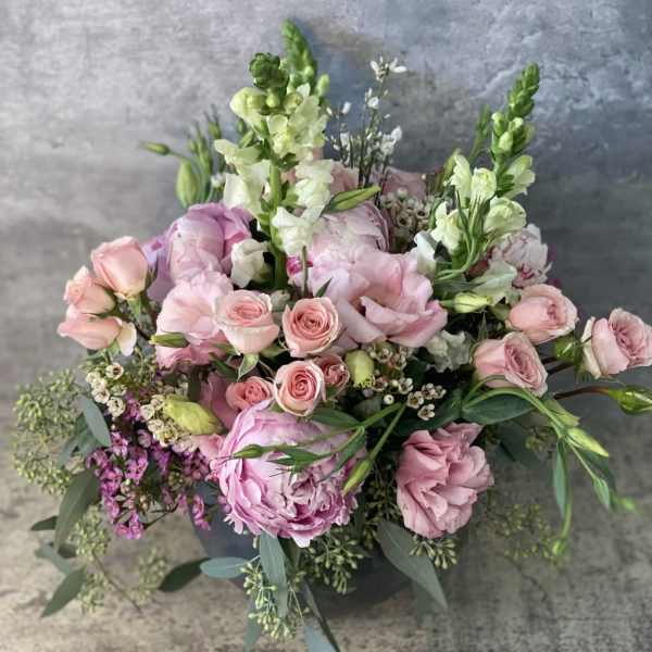 Pink bouquet with roses, peonies, and white snapdragons