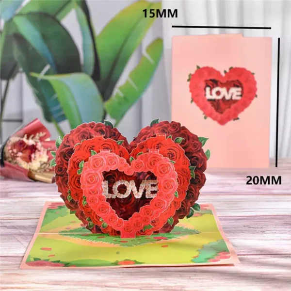Heart-shaped pop-up card with red roses and the word LOVE