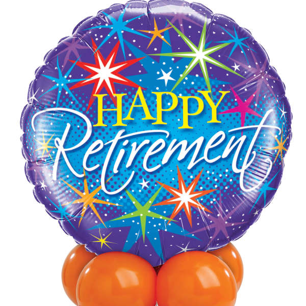 Purple retirement balloon with colorful starburst print and orange and purple balloons below