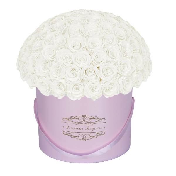 Round bouquet of white roses in a lavender hatbox