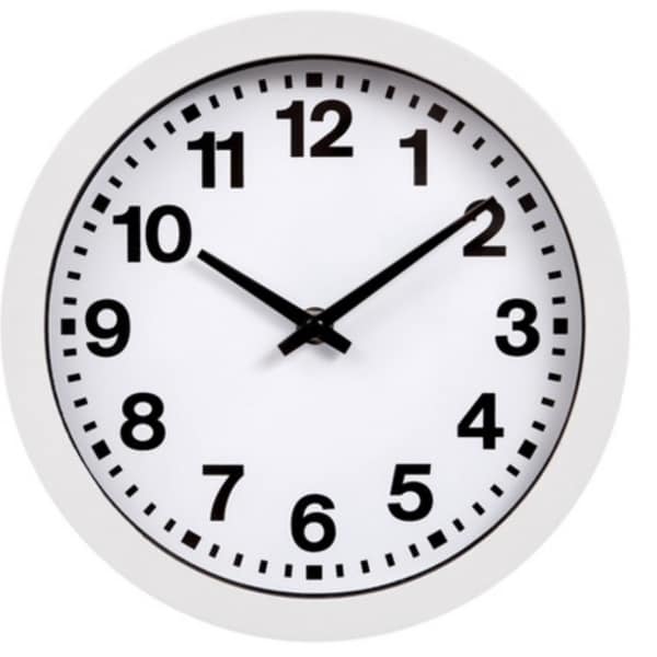 White wall clock with black numbers and hands