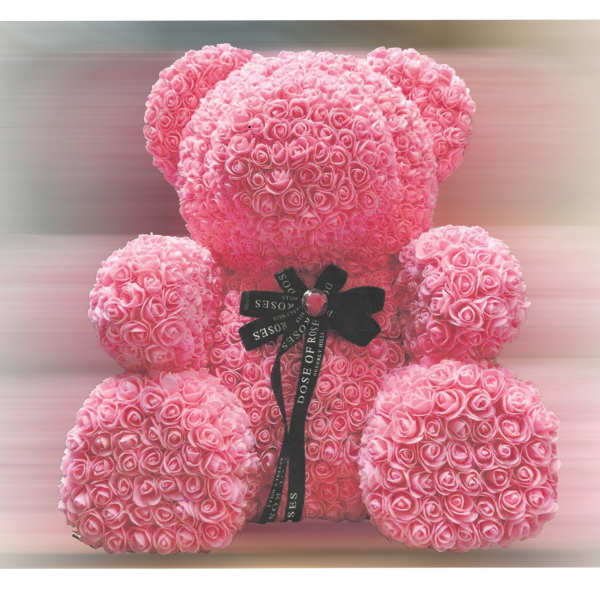 Pink rose teddy bear with a black ribbon bow