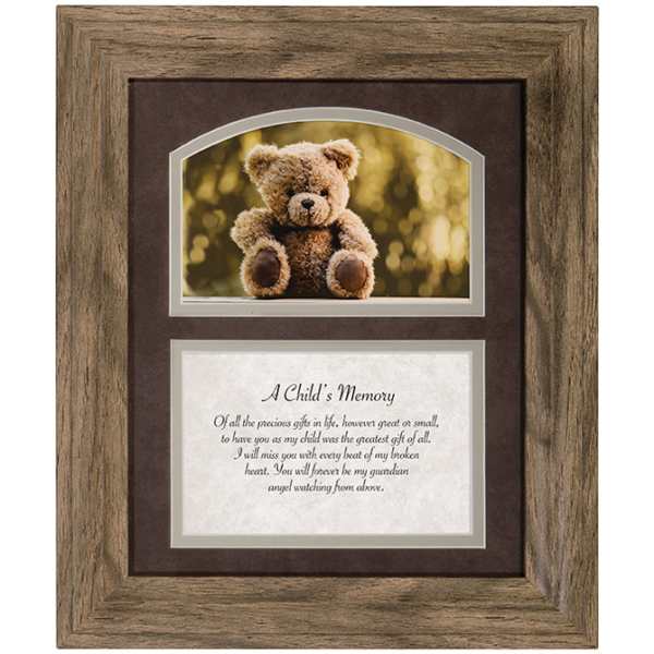 Framed memorial plaque with a teddy bear photo and remembrance text