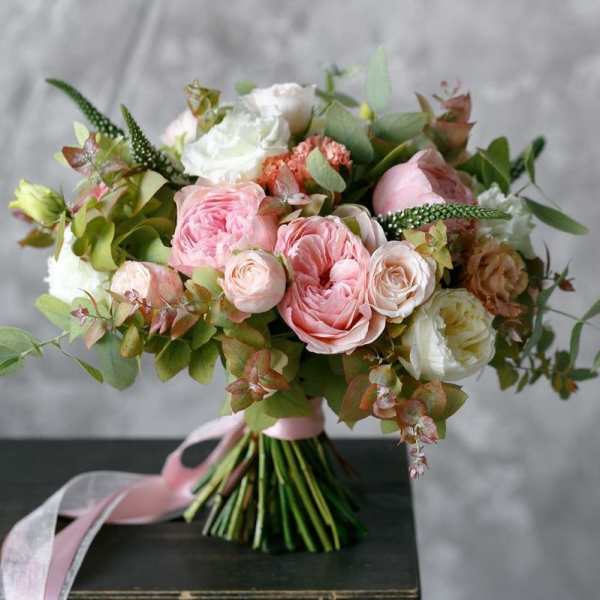 Pink and white rose bouquet with greenery and ribbon