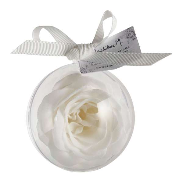 White rose in a clear round ornament with a ribbon bow