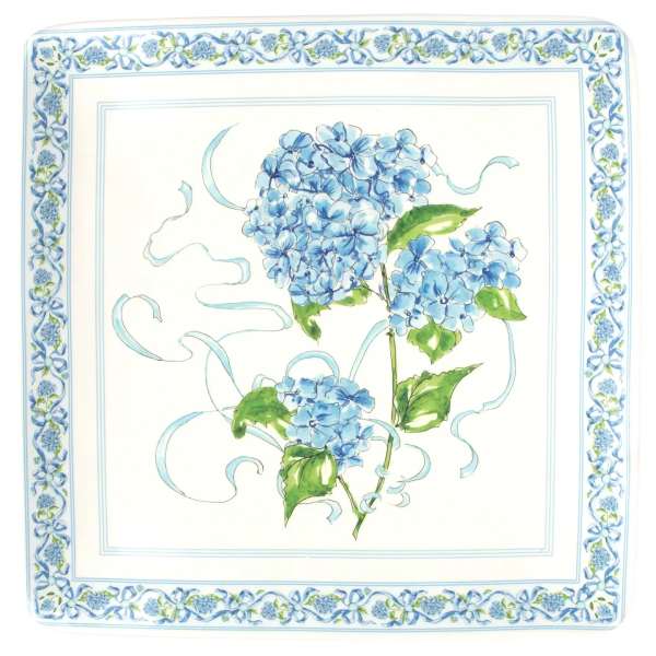 Blue hydrangea flowers on a square decorative plate